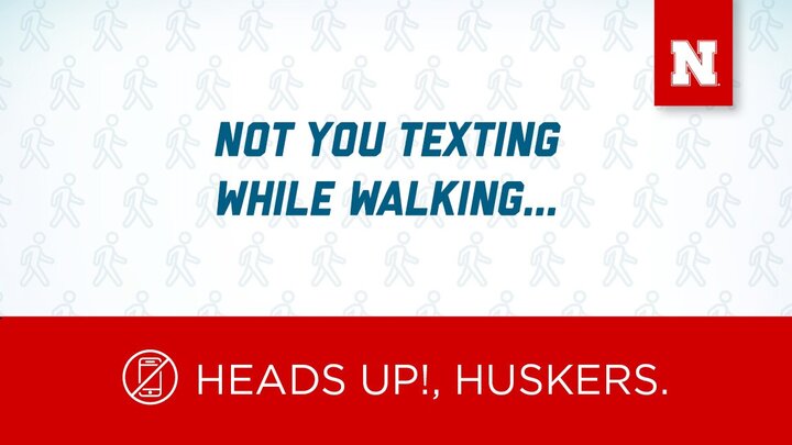 HEADS UP GRAPHIC NOT YOU TEXTING WHILE WALKING