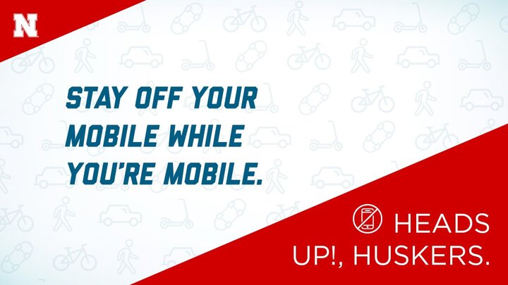 HEADS UP GRAPHIC STAY OFF YOUR MOBILE WHILE YOU'RE MOBILE